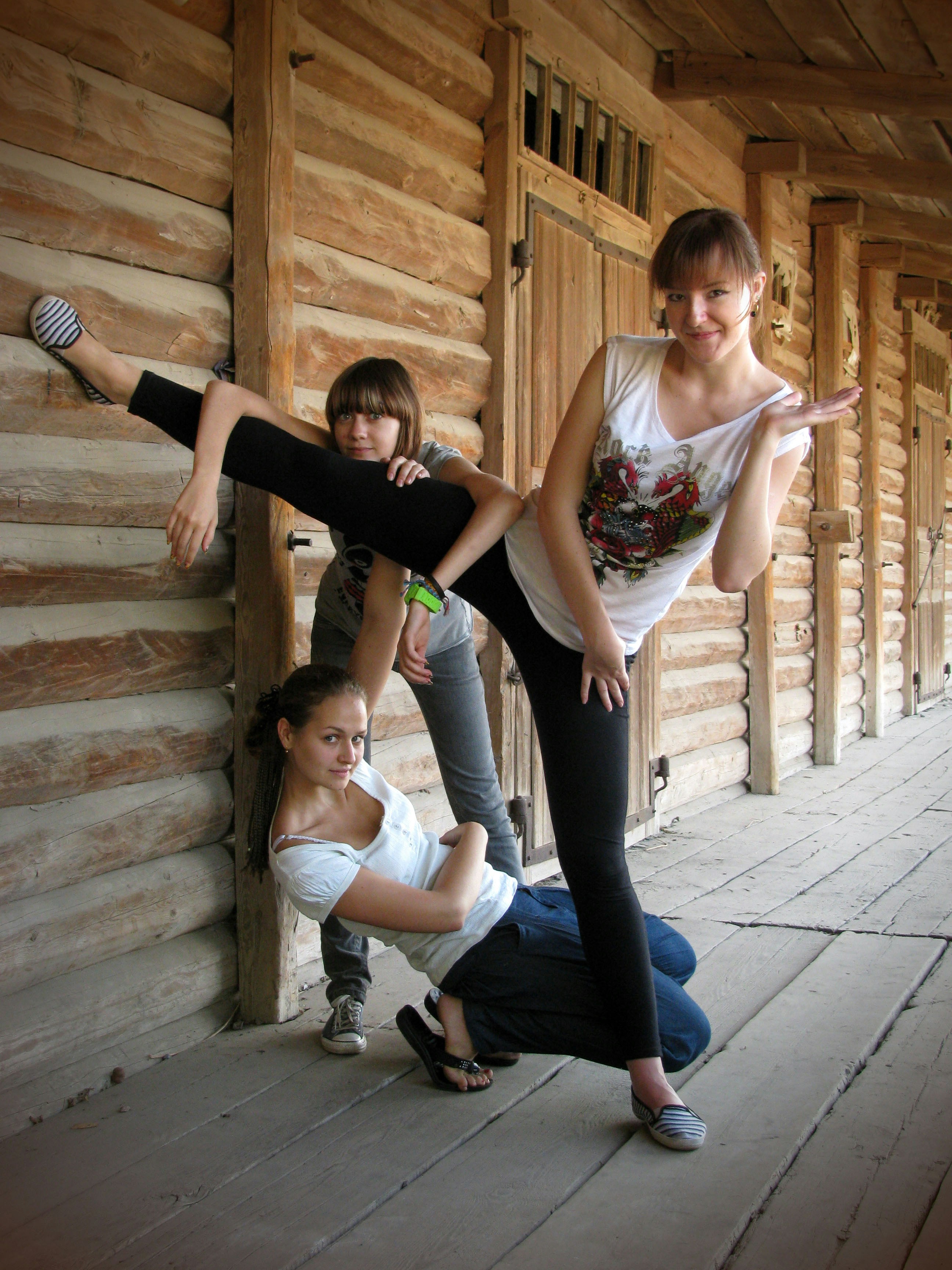 a group of young women standing next to each other