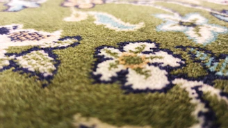 Freshly cleaned carpet with vibrant colors and no stains.