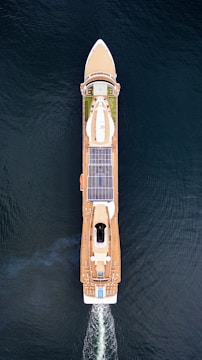 an aerial view of a boat in the water