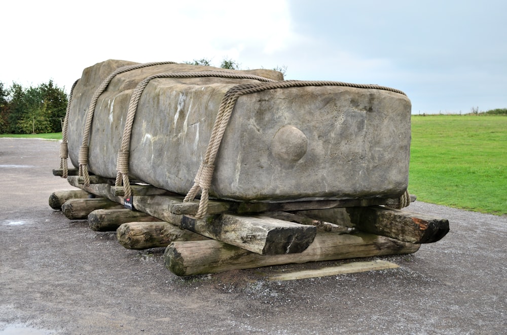 a large rock with ropes attached to it