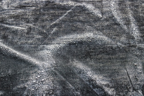 A close-up of a waterproof fabric showcasing its texture.