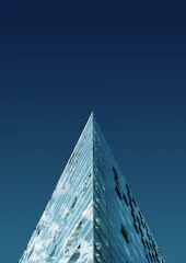a very tall building with a sky background