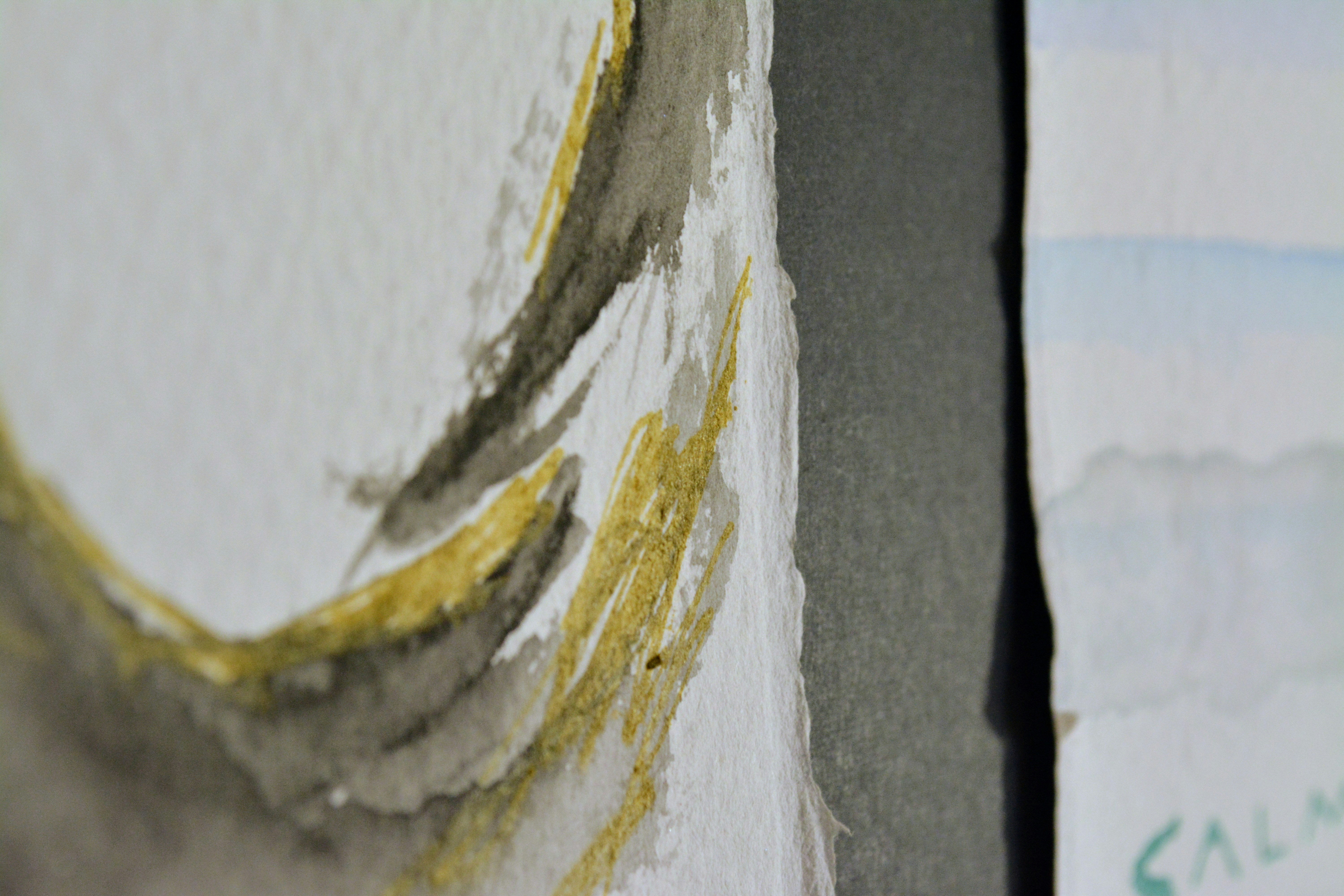 a close up of a piece of paper on a wall