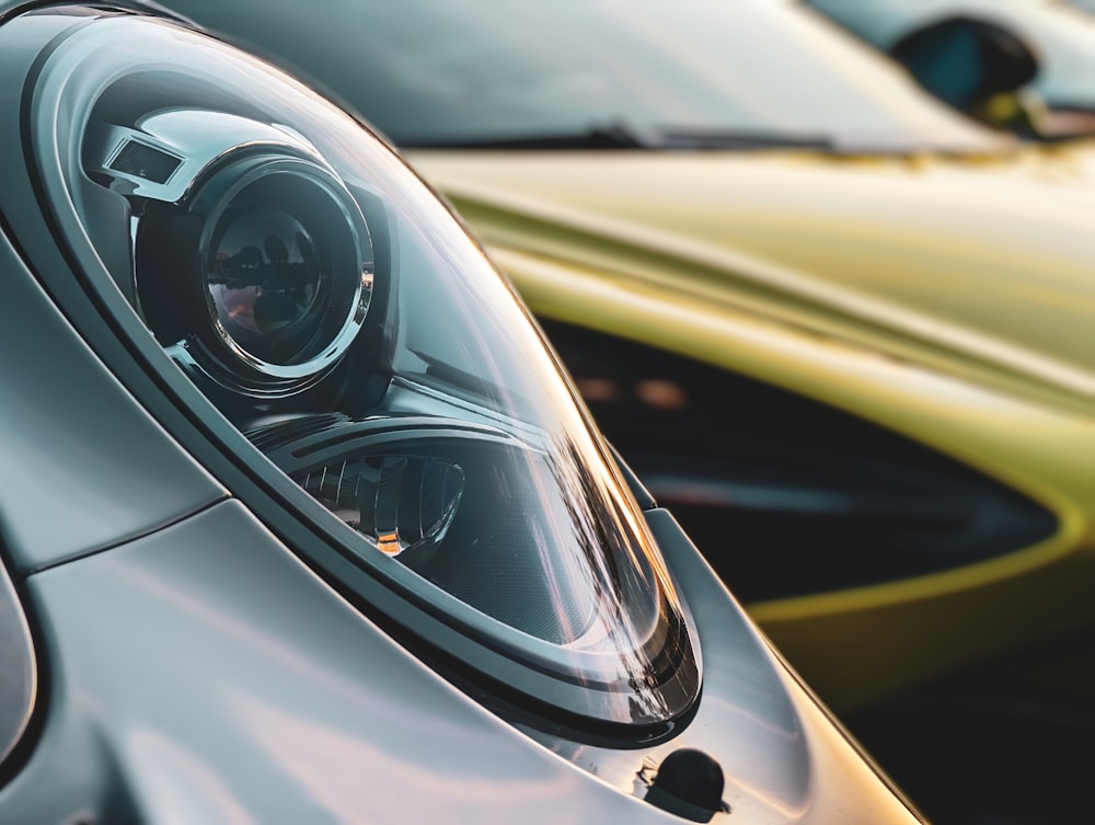 a close up of a car's headlight