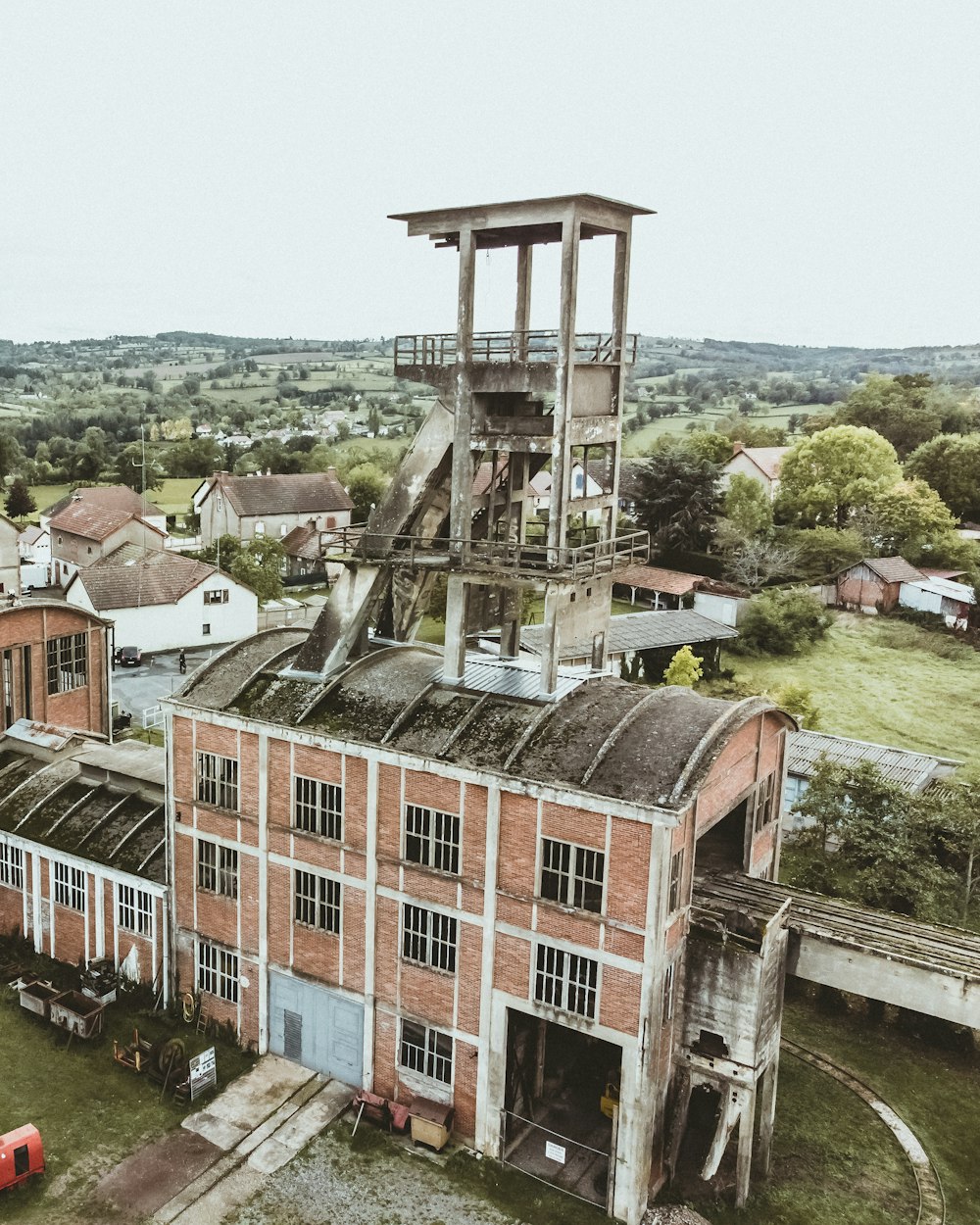 an aerial view of an old factory building