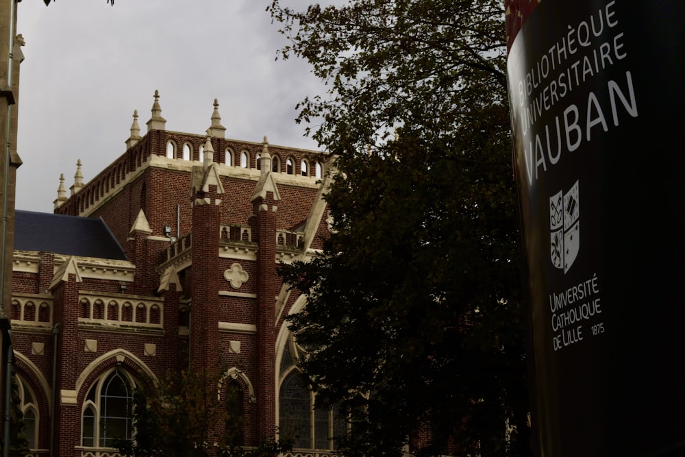 a large brick building with a clock tower