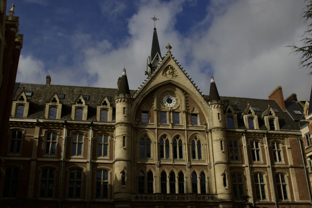 a large building with a clock on the front of it