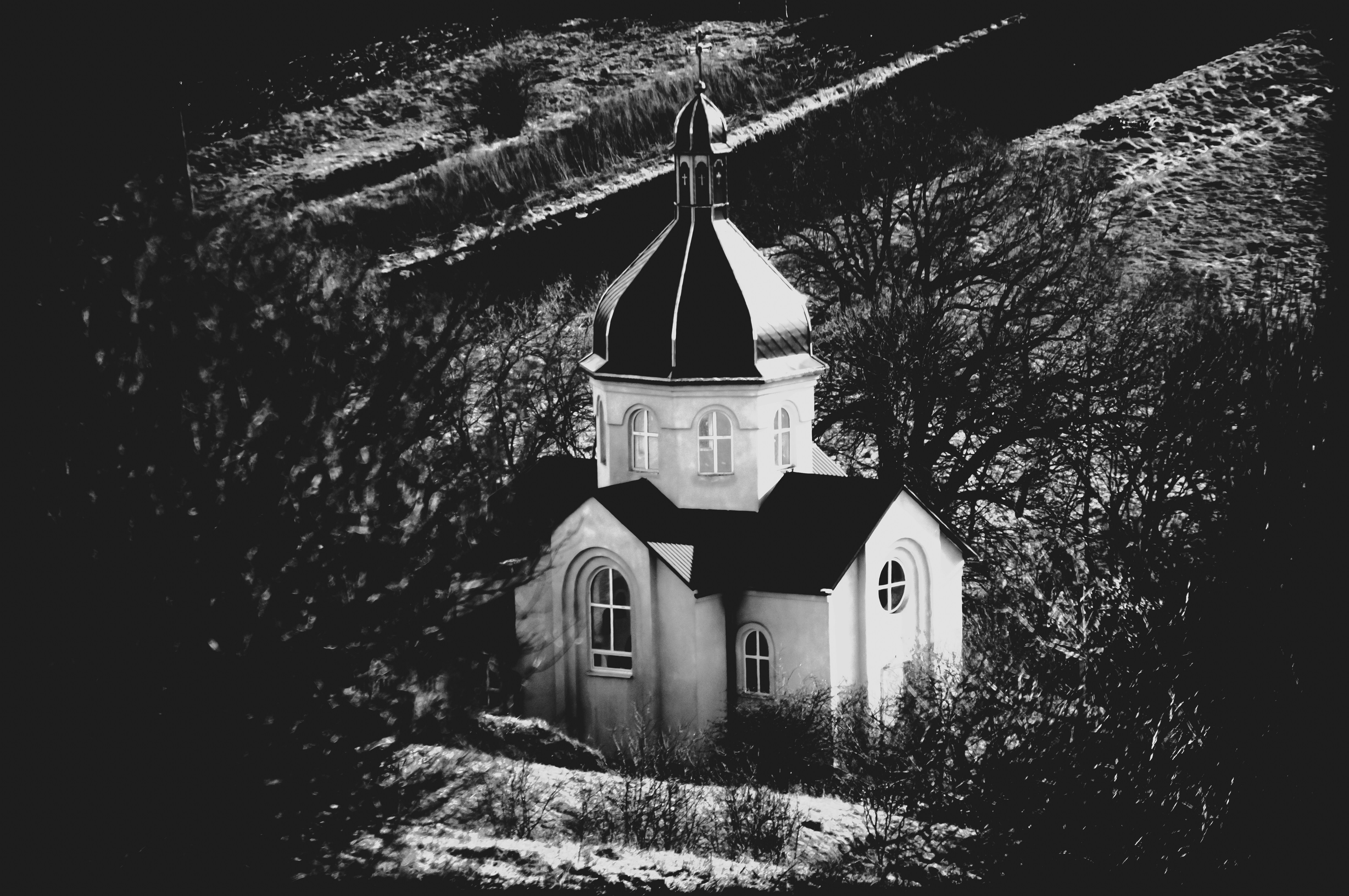 a black and white photo of a church