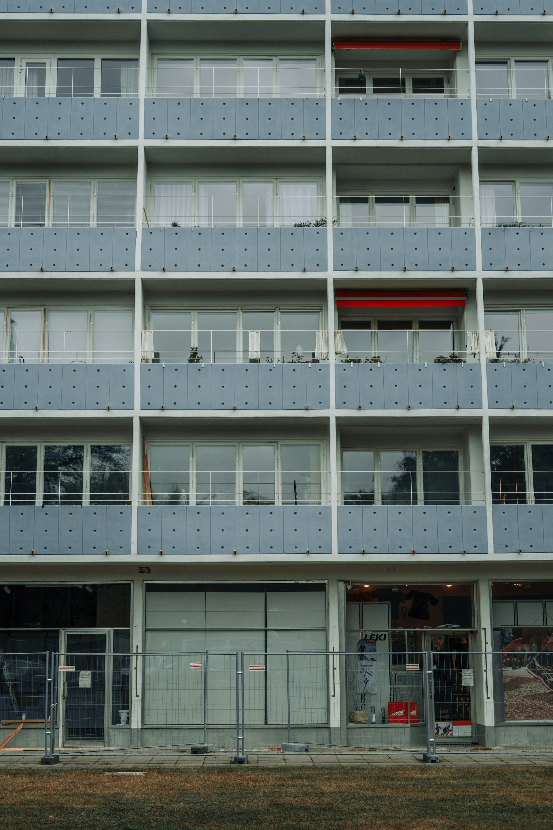 woman wearing yellow long-sleeved dress under white clouds and blue sky during daytime