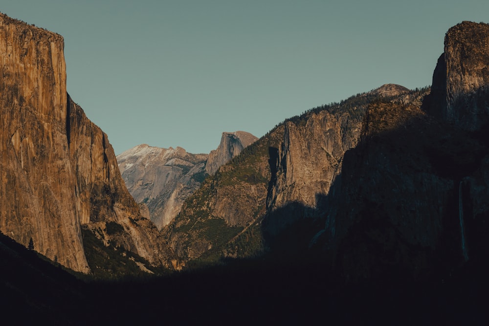 a view of a mountain range with mountains in the background