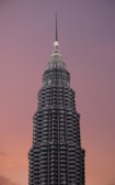 a very tall building with a clock on the top