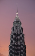 a very tall building with a clock on the top