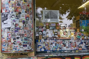 A vibrant storefront decorated with cash in box logos and posters inviting to the coupon hunt.