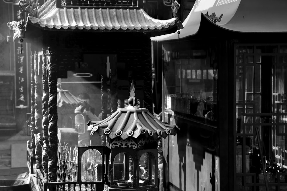 a black and white photo of a carousel