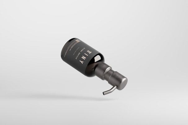 Close-up of a serum bottle with a sleek design.