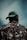 a man wearing a green hat looking up into the sky