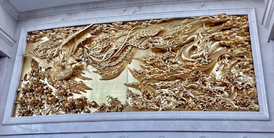 Lenticular print showcasing a shifting 3D image of a mythical phoenix in flight.