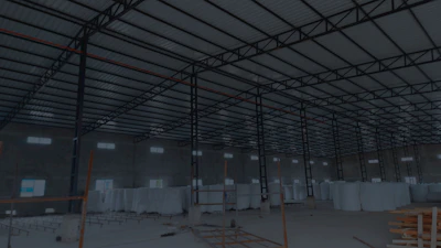 A wide shot of the resharing warehouse filled with cotton products under natural light.