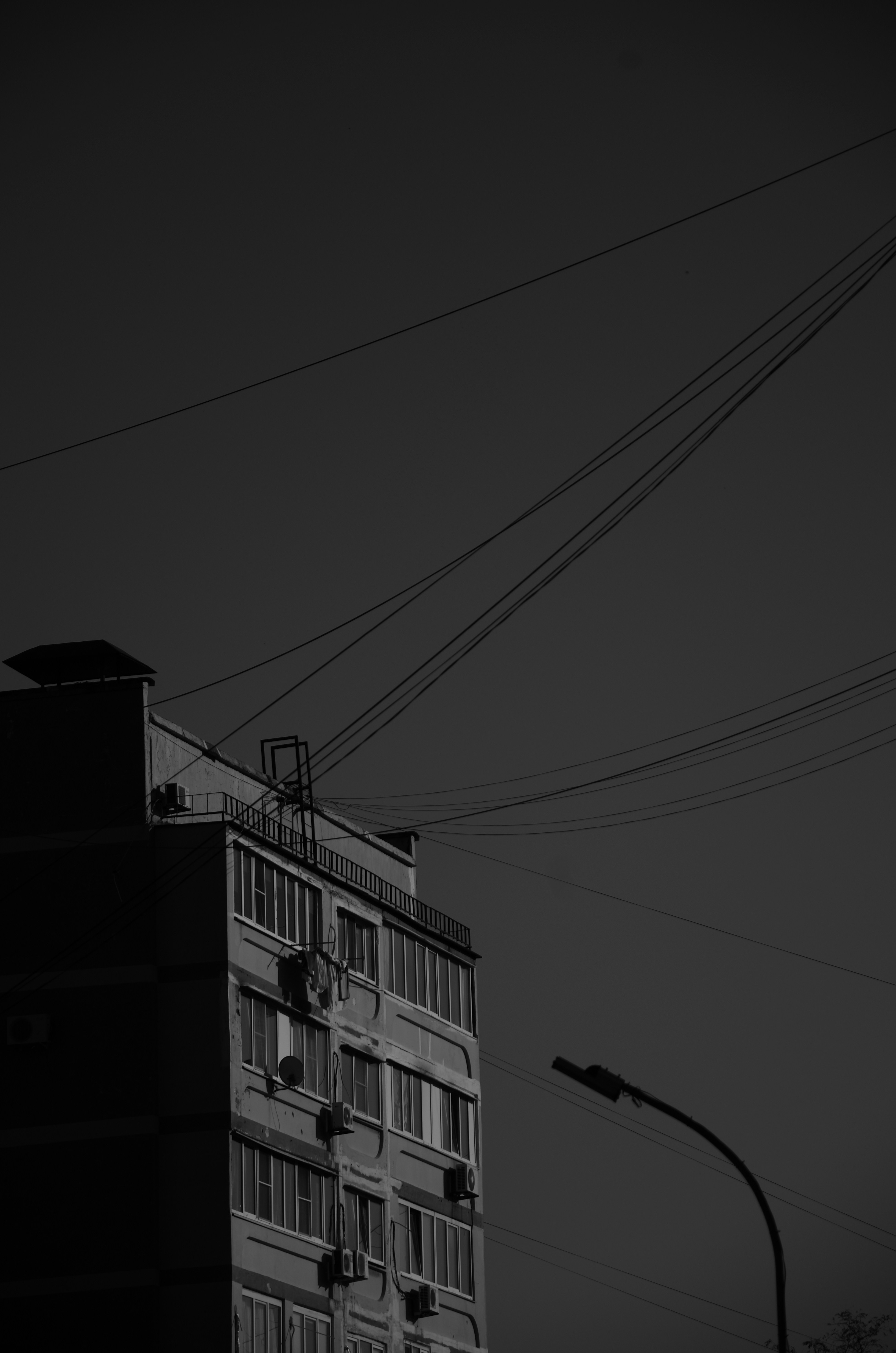 a black and white photo of a tall building