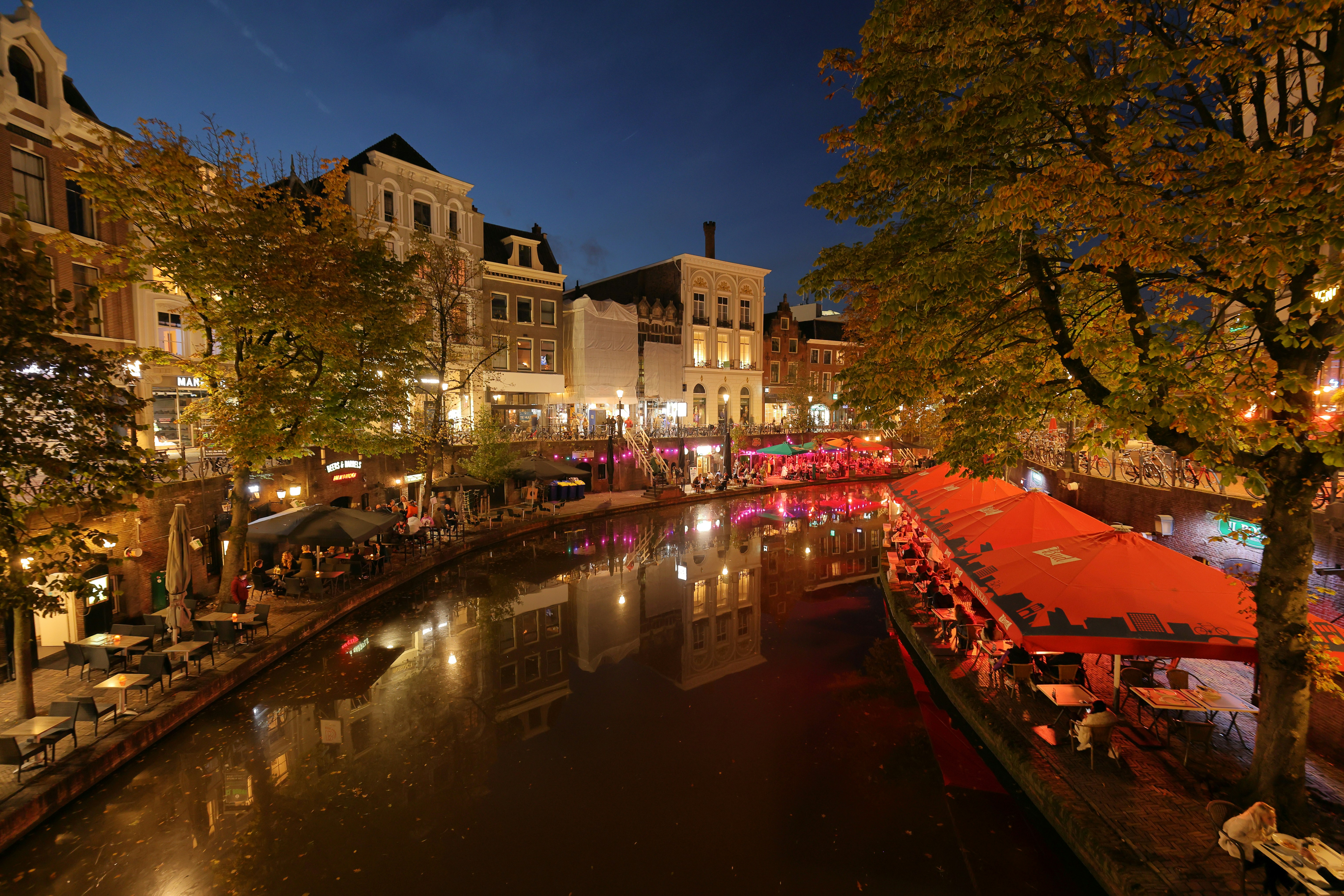 a river running through a city at night