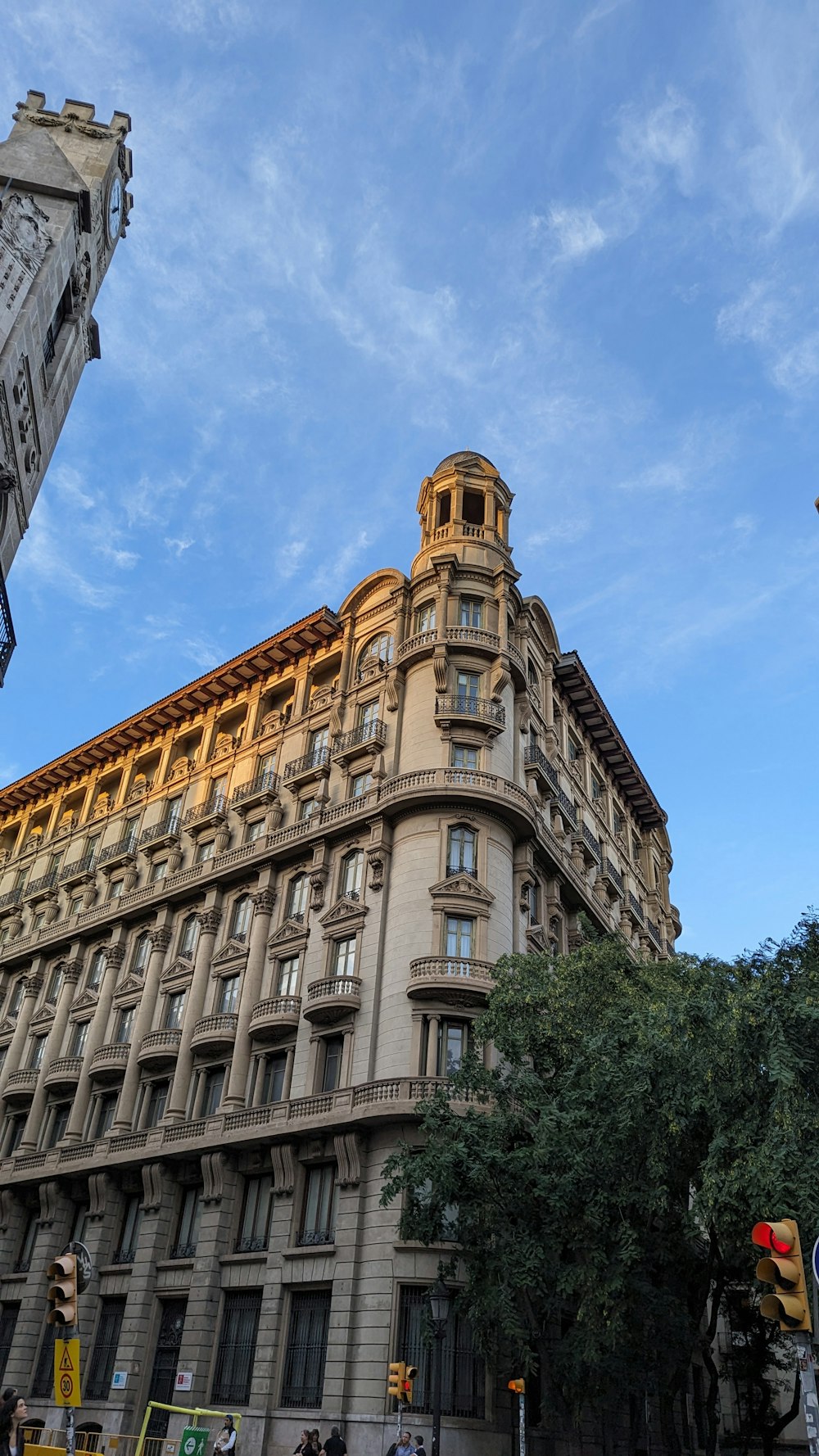 a tall building with a clock on the top of it