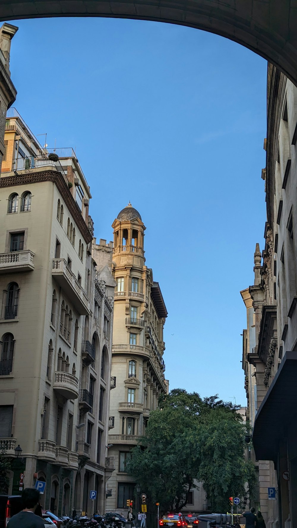 a city street filled with lots of tall buildings