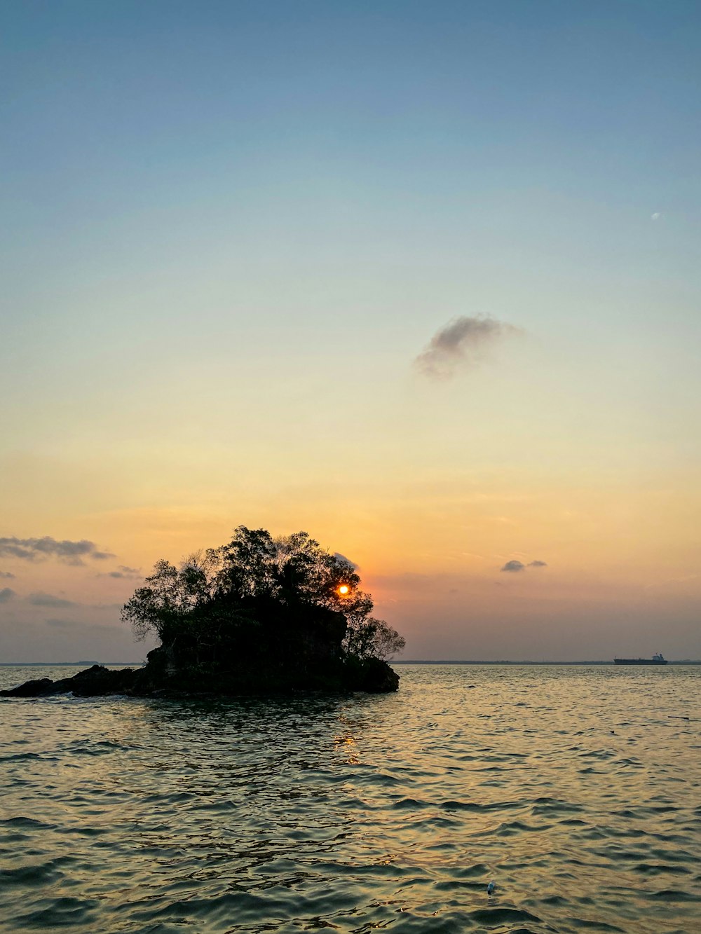 a small island in the middle of a body of water