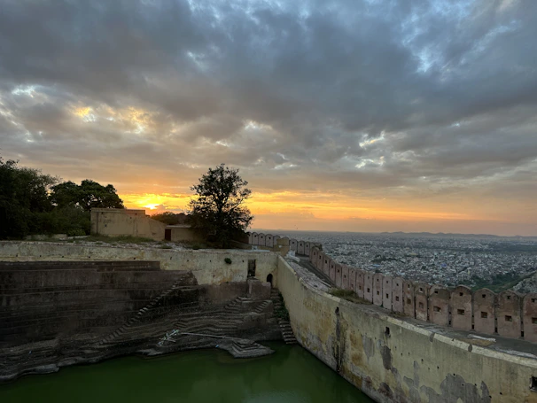 Sunset view over Zadar’s ancient city walls with the sea in the background.