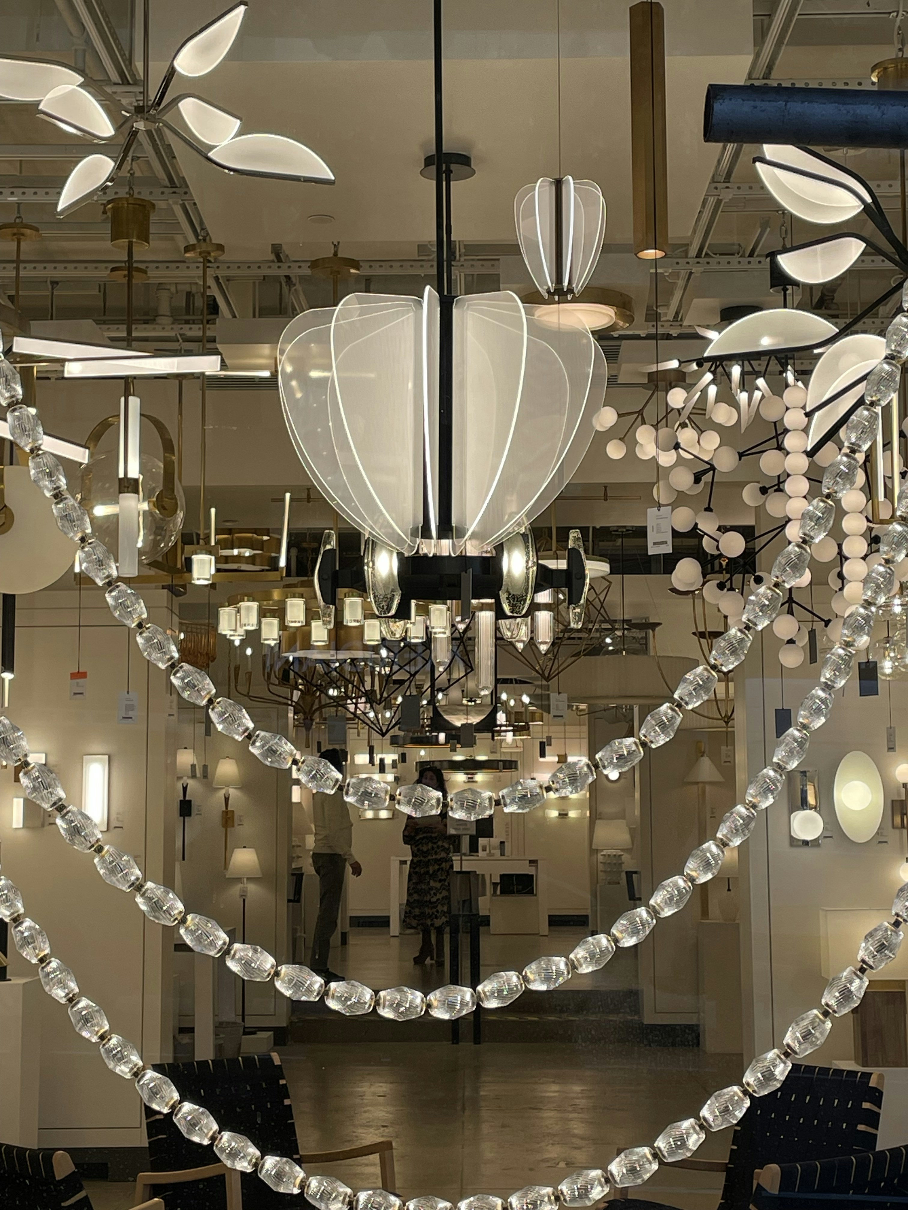 Inside a professional plumbing merchant showroom with pipes, fittings and bathroom displays, bright retail lighting