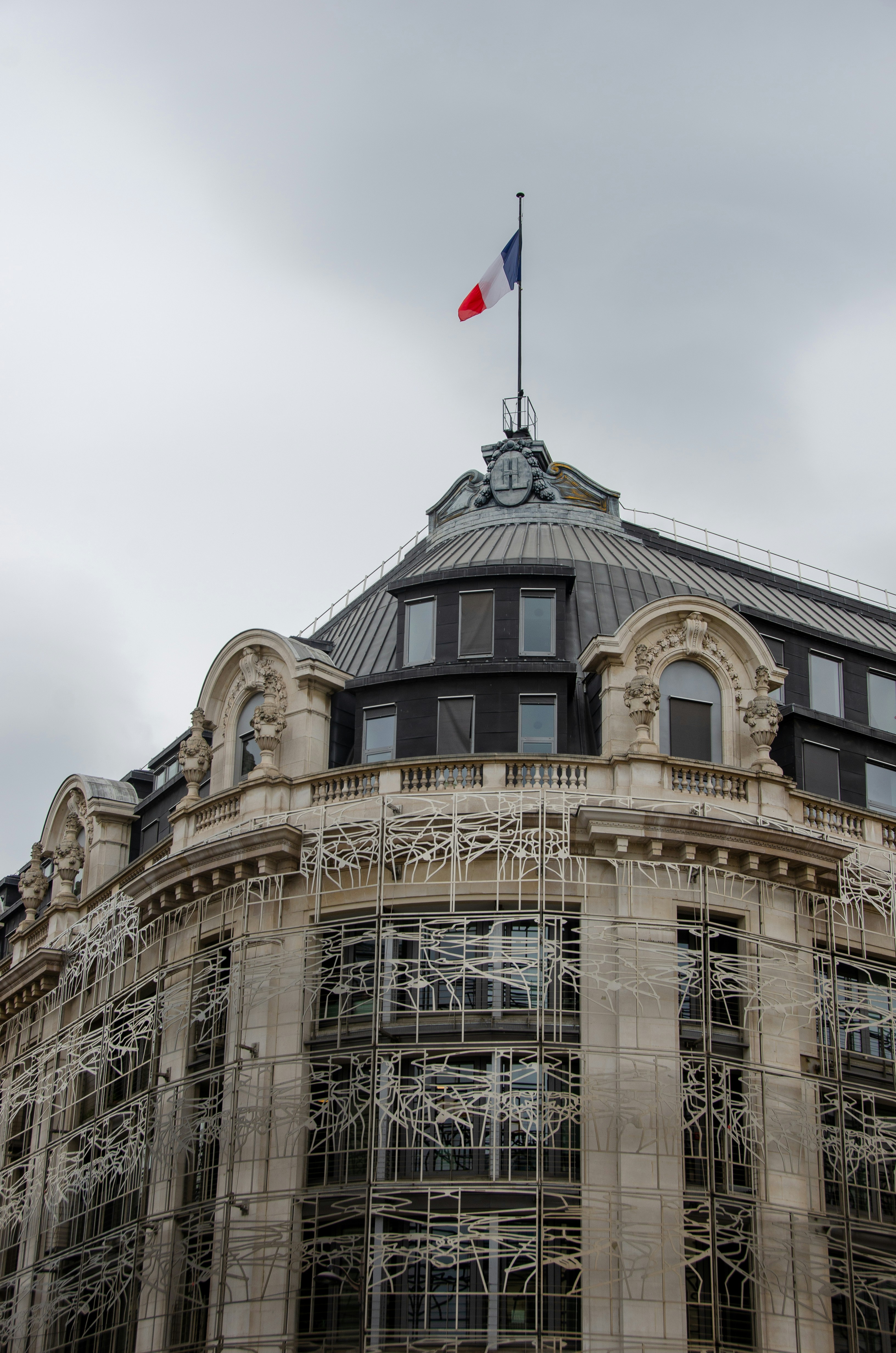 a large building with a flag on top of it