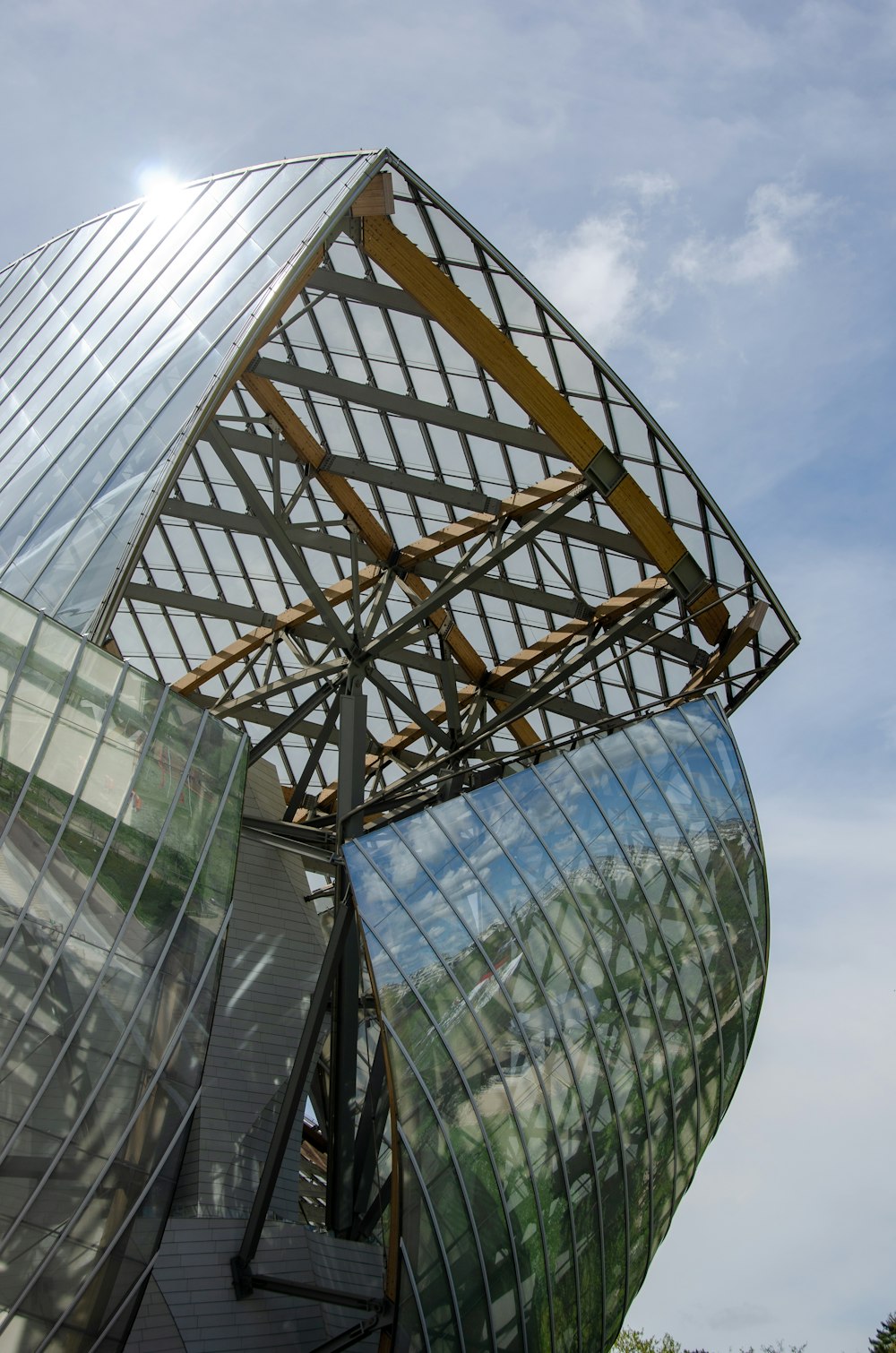 a large metal structure with a sky background