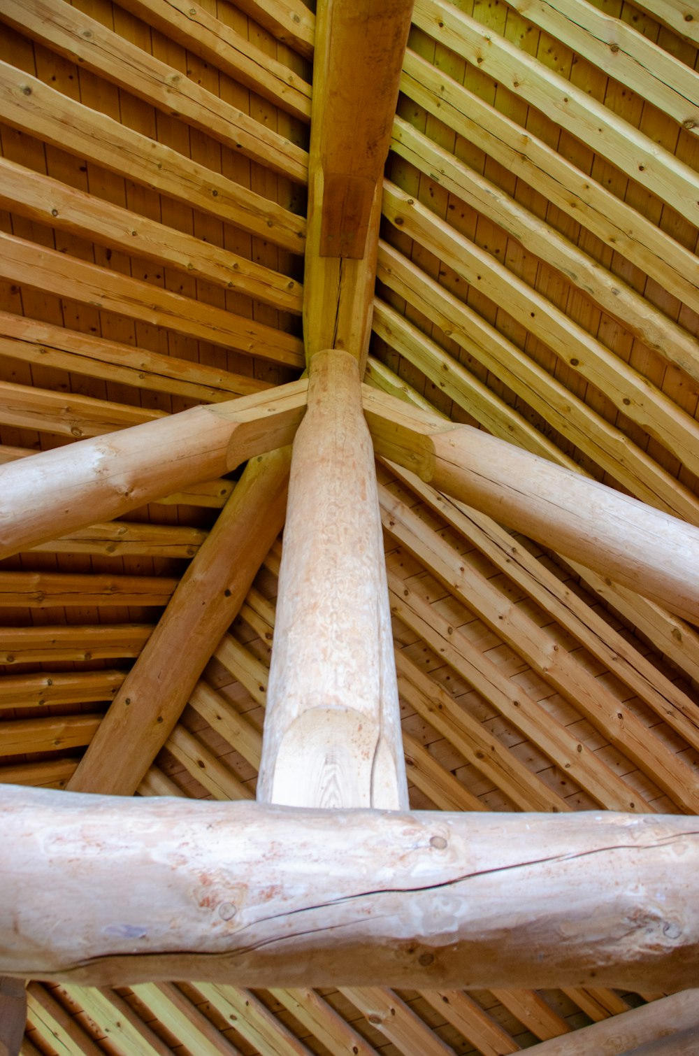 a close up of a wooden structure made of logs