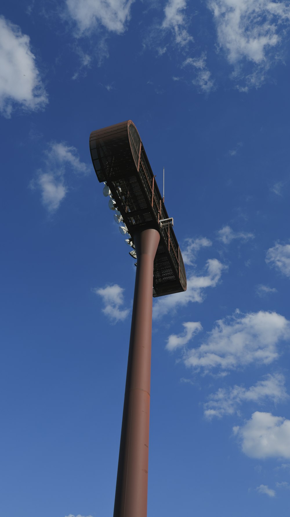 a tall tower with a sky in the background