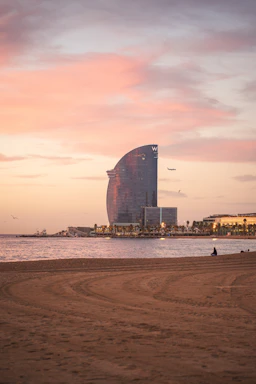 Modern beachfront apartment complex in Da Nang with sunset view.