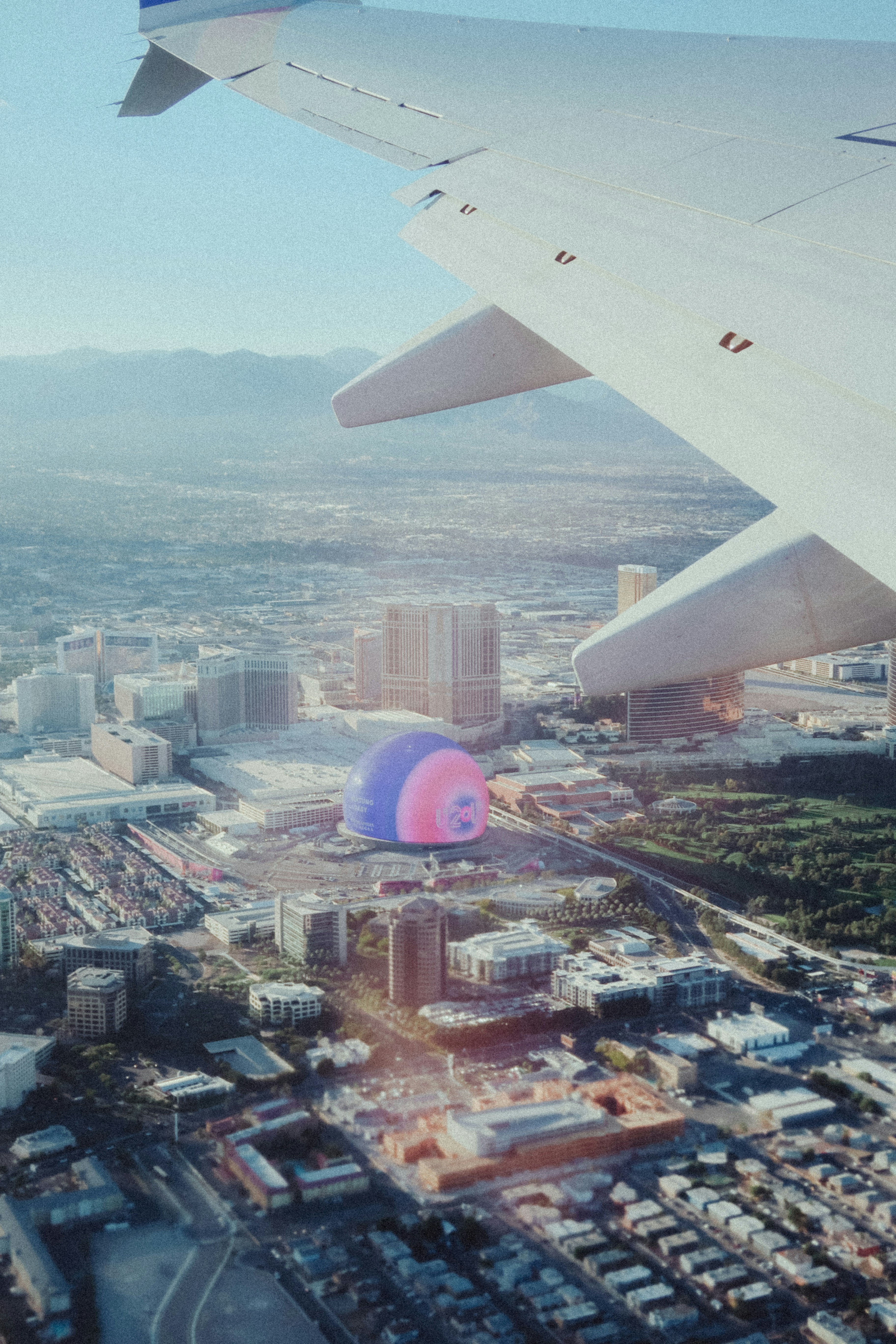 a view of a city from an airplane