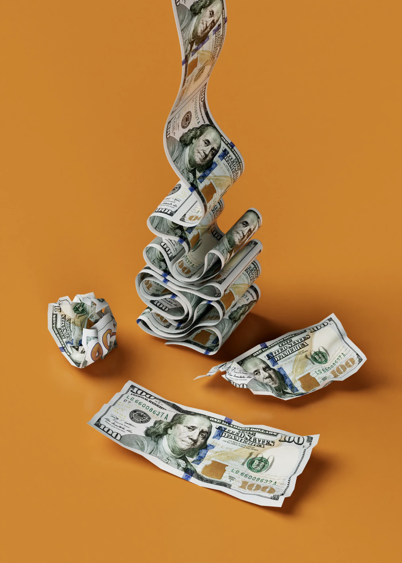 Billetes arrugados sobre una superficie naranja