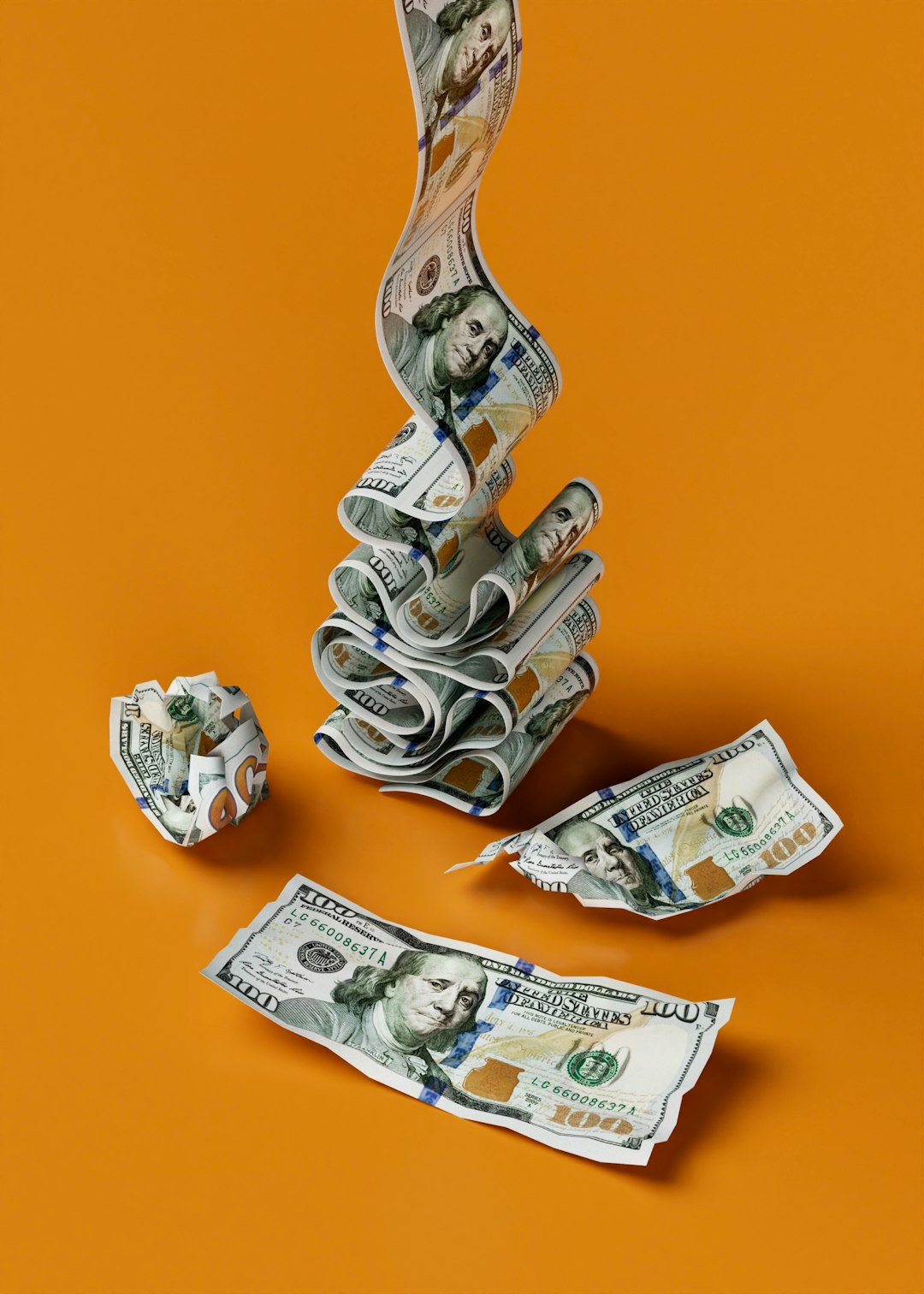a stack of money sitting on top of a table