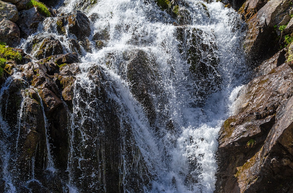 a large waterfall with lots of water coming out of it