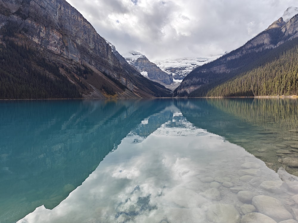 a large body of water surrounded by mountains