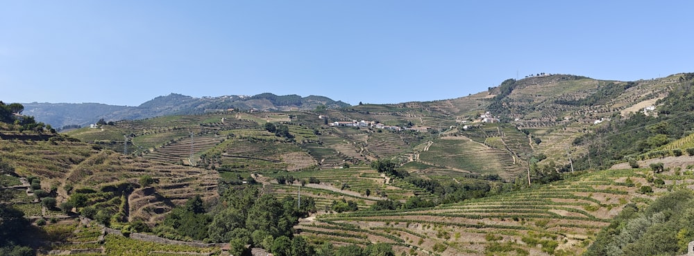 a view of a mountain side with many terraces