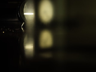 A calm clock face with soft lighting, symbolizing patience and time passing.