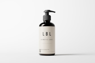 A dark brown bottle with a pump dispenser, featuring a minimalistic label displaying the text 'LBL Cosmetic Label' and additional information. The background is plain and light-colored, creating a clean, modern appearance.