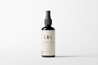 A minimalistic cosmetic bottle with a pump dispenser is positioned centrally against a plain white background. The bottle is dark in color with a simple, elegant label that reads 'LBL COSMETIC LABEL'. The design emphasizes clean lines and simplicity, highlighting the brand's focus on elegance and modern aesthetics.