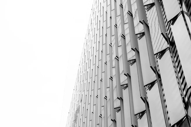 a black and white photo of a tall building