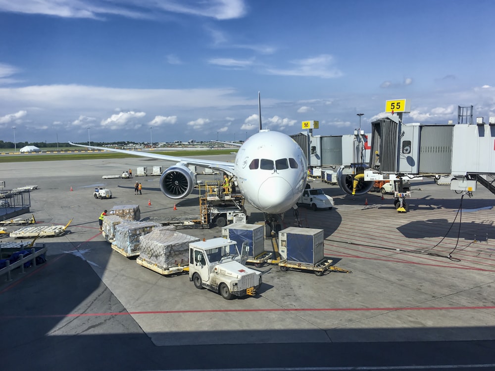 a large jetliner sitting on top of an airport tarmac