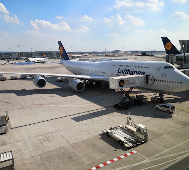 a large jetliner sitting on top of an airport tarmac
