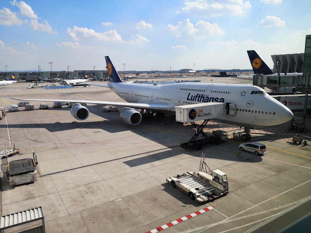 a large jetliner sitting on top of an airport tarmac,