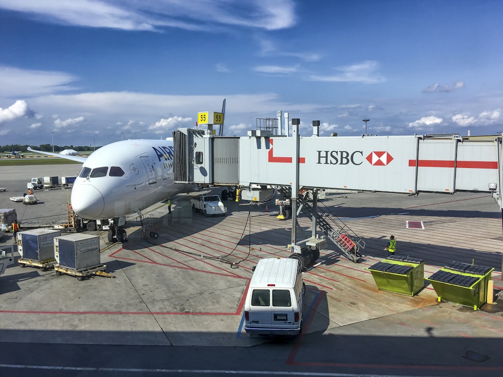 a large jetliner sitting on top of an airport tarmac