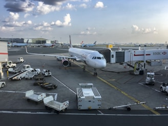 a large jetliner sitting on top of an airport tarmac