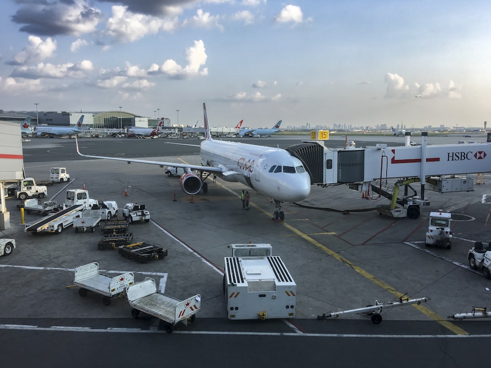 a large jetliner sitting on top of an airport tarmac